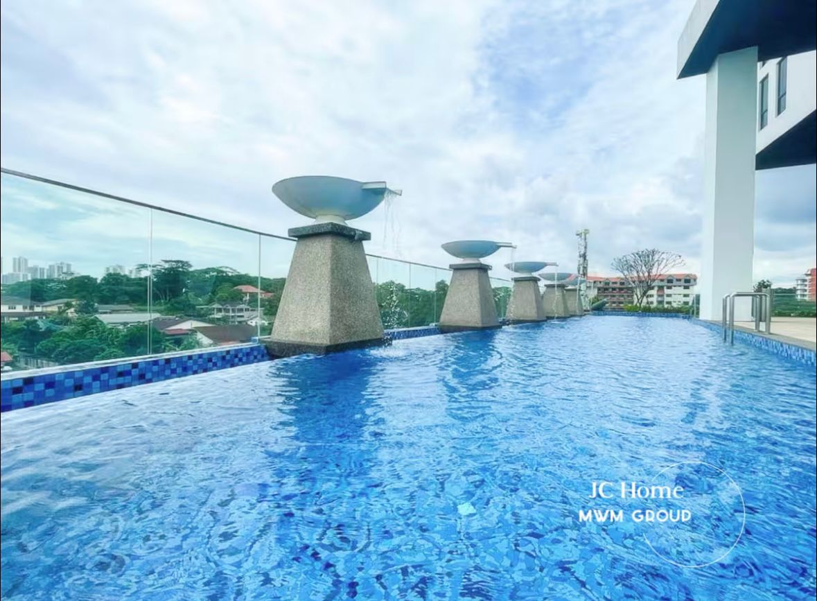 Outdoor swimming pool with water features