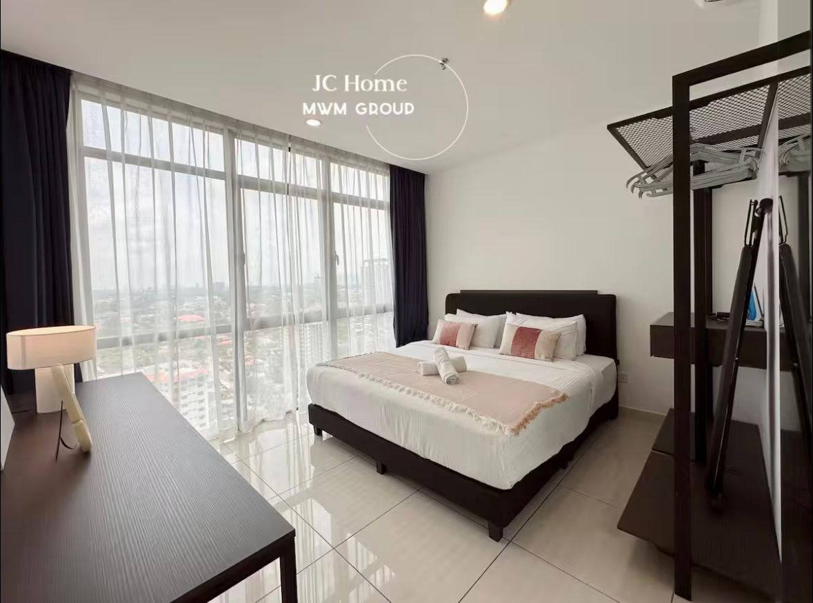 Bedroom with desk and wardrobe
