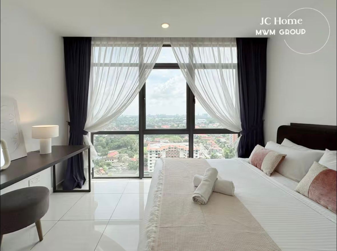 Bright bedroom with city view