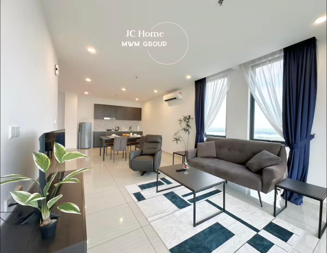 Suite living room with city-facing windows
